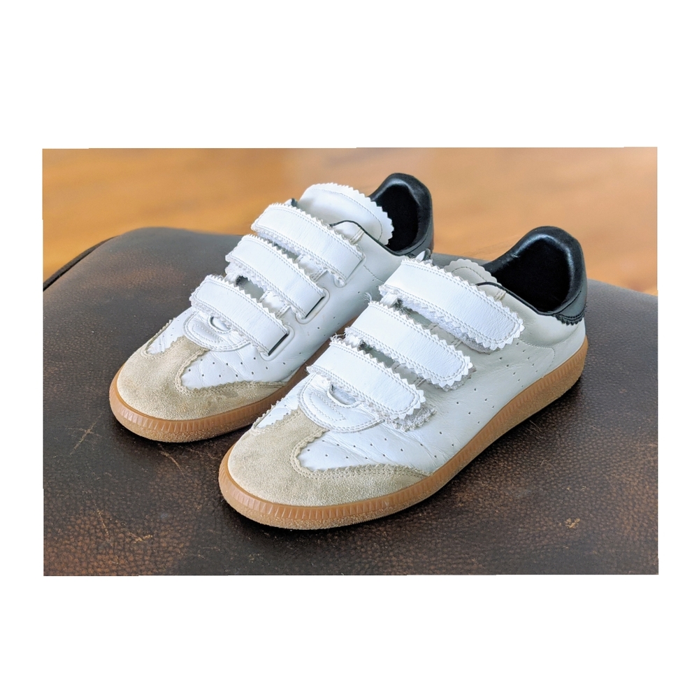 ISABEL MARANT scalloped sneakers.